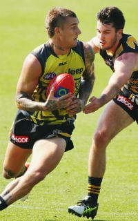 Dustin Martin breaks away from Corey Ellis in the Tigers' intra-club practice match - ${keywords}